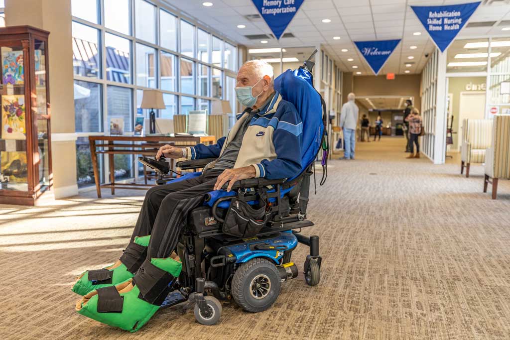 Man using motorized wheelchair